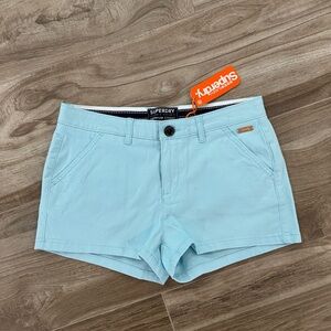BNWT Superdry Blue Shorts. Size 4
